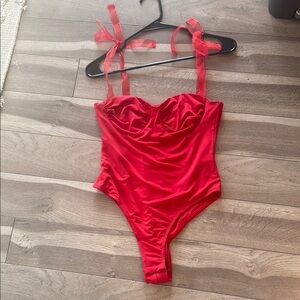 Princess Polly body suit with ribbon tie straps, size US 6